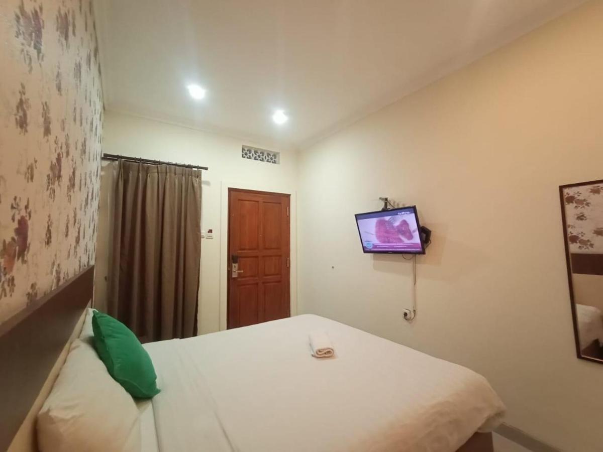 Oyo 90473 Gowin Hotel Kuta  Exterior photo