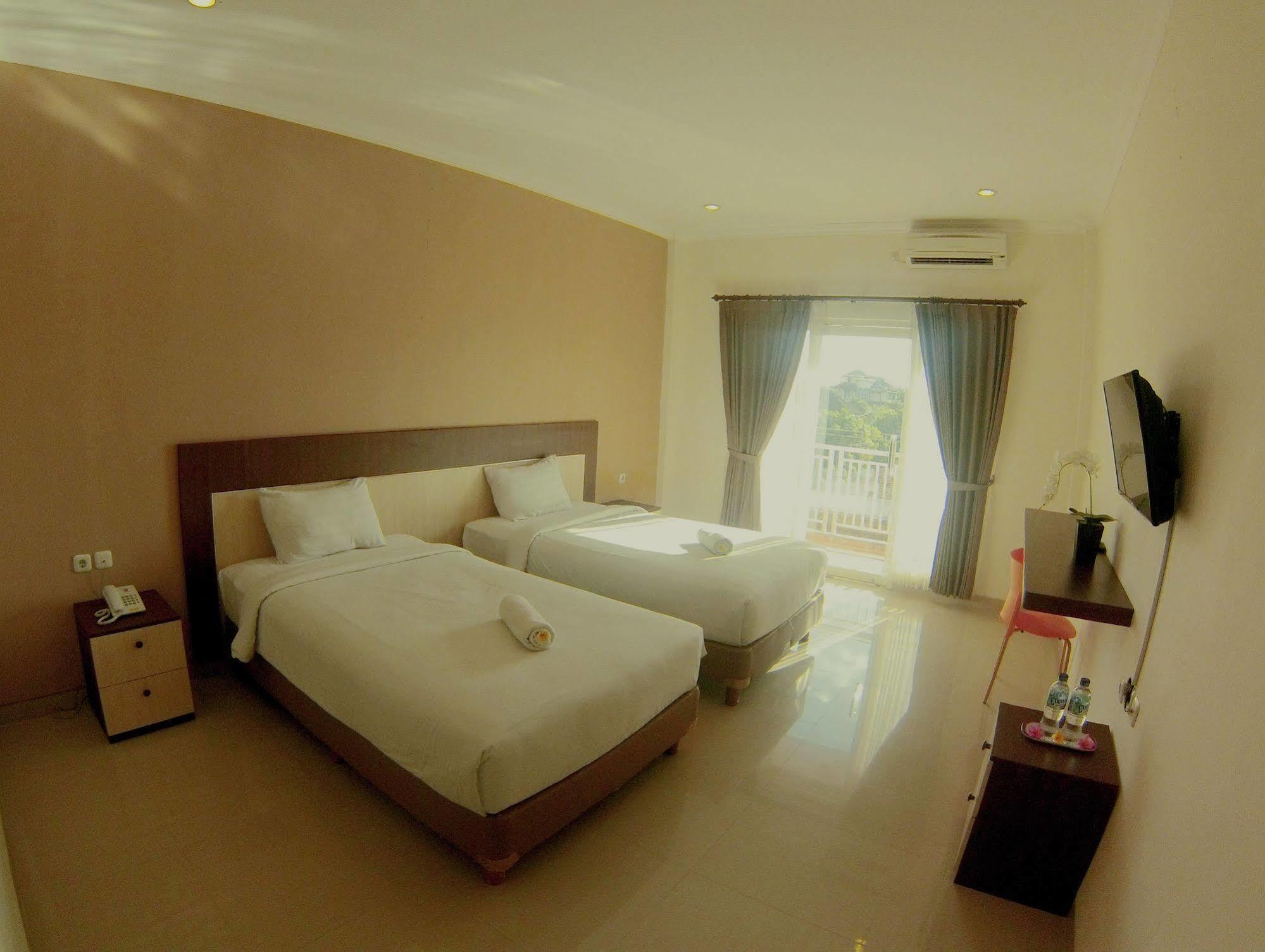 Oyo 90473 Gowin Hotel Kuta  Exterior photo